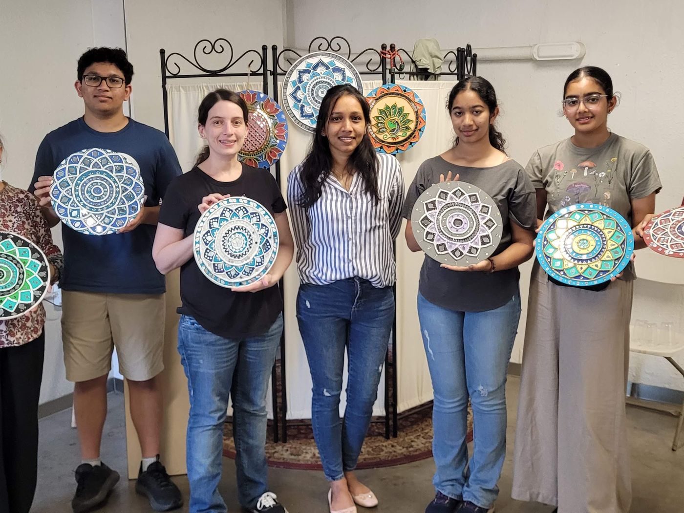 Priyanka with workshop participants and their finished mandalas